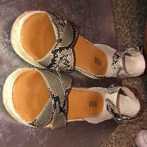 Brand new snake skin sandals .